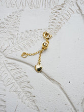 18K metal-clad extension chain with a heart-shaped pendant