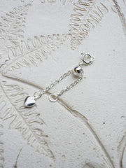 18K metal-clad extension chain with a heart-shaped pendant