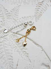 18K metal-clad extension chain with a heart-shaped pendant